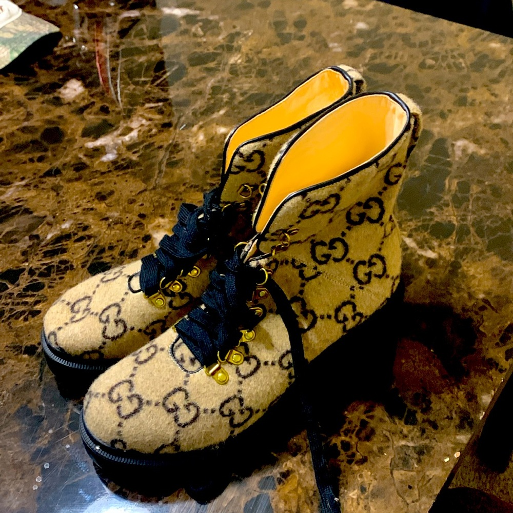 Tan and black gucci boots